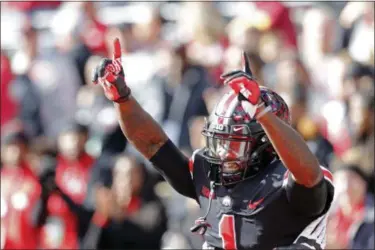  ?? JAY LAPRETE — THE ASSOCIATED PRESS ?? Ohio State receiver Johnnie Dixon celebrates his touchdown against Nebraska during the first half on Nov. 3 in Columbus.