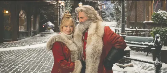  ?? JOSEPH LEDERER/ NETFLIX ?? Goldie Hawn plays a more prominent Mrs. Claus opposite real-life partner Kurt Russell (three guesses who his character is) in The Christmas Chronicles 2.