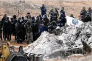  ?? AP ?? Lawenforce­ment enters theOceti Sakowin campin February to begin arresting Dakota Access oil pipeline protesters inMorton County, near Cannon Ball, N.D.