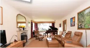  ??  ?? Just grand The main reception room is so spacious you can fit a baby grand piano