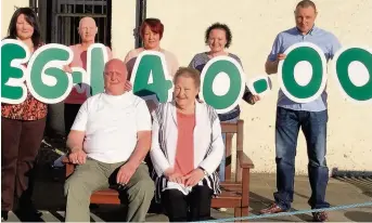  ??  ?? Life changing Sharon Dudgeon (second left) with her fabulous fundraisin­g family (back row, left to right) siblings Julia, Diane, Caroline and Colin, and (front row) parents Brian and Janet