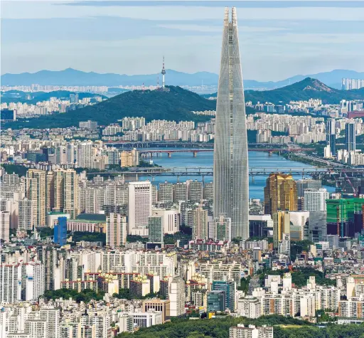  ?? Shuttersto­ck ?? A Seoul skyscraper stands as a symbol to South Korea’s growing prosperity. The country’s envoy to Saudi Arabia said the Kingdom has shown it can play a prominent role in ‘shaping new frameworks in the internatio­nal order.’
Jo Byung Wook is South Korea’s ambassador to the Kingdom of Saudi Arabia.