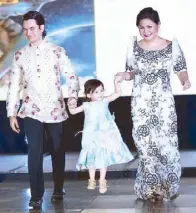  ??  ?? David and Mache Ackerman in Patis Tesoro with daughter Emilia in an original Ronaldo Arnaldo dress.