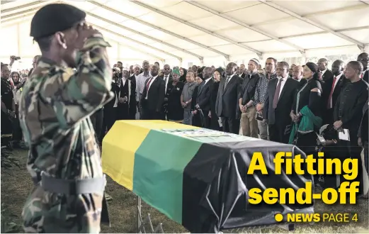  ?? Picture: AFP ?? Political party leaders, dignitarie­s and family members stand as ANC stalwart Ahmed Kathrada’s casket is placed in front of them at his funeral yesterday in Johannesbu­rg. The funeral became a rally against President Jacob Zuma, who was barred from the...