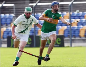  ??  ?? Eoin Keddy of Kilcoole is chased by Sean Somers of Arklow Rock Parnells.