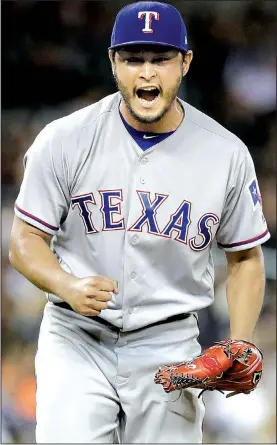  ?? AP file photo ?? The Texas Rangers traded pitcher Yu Darvish (above) to the Los Angeles Dodgers on Monday for three minor league players. Darvish, 30, is 6-9 with a 4.01 ERA in 22 starts this season. The Dodgers (74-31) entered Monday leading the National League West...