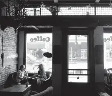  ??  ?? Customers relax inside Dog Coffee, whch is in Salida’s historic downtown area. Salida is about a three-hour drive from Denver.