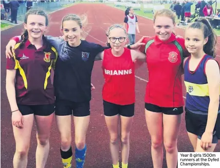  ??  ?? Year 8 girls 1500m runners at the Dyfed Championsh­ips.