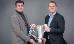  ??  ?? Hold tight: Derry City manager Declan Devine (left) and Dundalk boss Vinny Perth with EA Sports Cup ahead of tomorrow night’s final at the Brandywell
