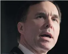  ?? ADRIAN WYLD/THE CANADIAN PRESS ?? Minister of Finance Bill Morneau has promised to examine ‘tax expenditur­es’ — i.e. targeted tax breaks — and will be conducting a review of the tax code.