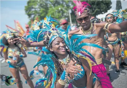  ??  ?? Jasmine Conner of St. Croix comes to town each year for the Caribbean Carnival party.