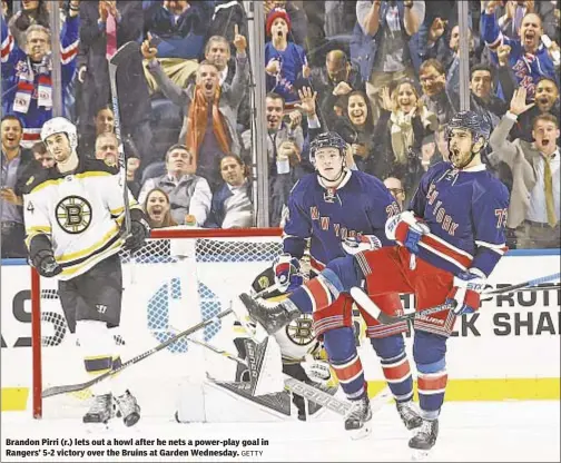  ?? GETTY ?? Brandon Pirri (r.) lets out a howl after he nets a power-play goal in Rangers’ 5-2 victory over the Bruins at Garden Wednesday.