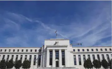  ?? — Reuters ?? The Federal Reserve Board building on Constituti­on Avenue is pictured in Washington, US.