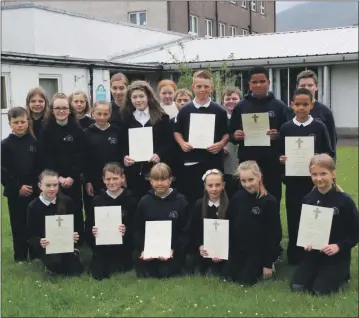  ?? Anthony MacMillan Photograph­y ?? Pupils who received the Pope Francis Faith Awards at their end of term award ceremony.