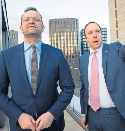  ?? Picture: PA. ?? Health Secretary Matt Hancock, right, with German Health Minister Jens Spahn at the Department of Health, Westminste­r, ahead of a meeting on coronaviru­s.