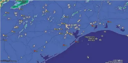  ??  ?? Pictured is a screenshot of FlightAwar­e's website, where it provides live flight tracking. The real-time data help airlines schedule crews, assign planes to gates and organize de-icing work.