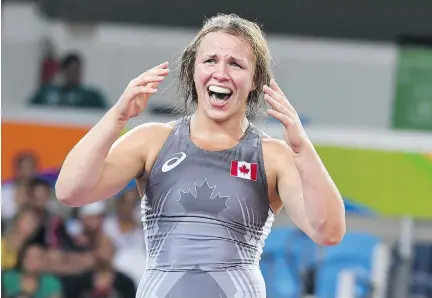  ?? TOSHIFUMI KITAMURA/AFP/GETTY IMAGES ?? Erica Wiebe came through for Canada, winning Olympic gold in the women’s 75-kilogram wrestling final.