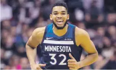  ??  ?? Karl Towns se reintegró a los Wolves.