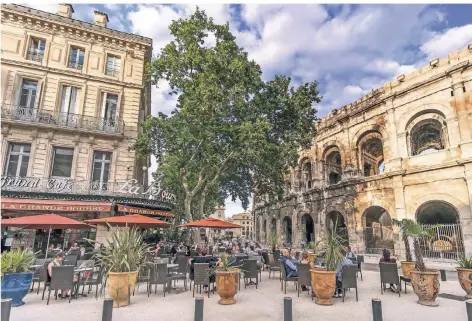  ?? FOTOS: IMAGO ?? Das römische Amphitheat­er in der Innenstadt von Nîmes ist die besterhalt­ene römische Arena weltweit.