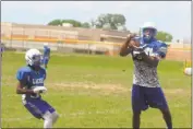  ?? STAFF PHOTOS BY AJ MASON ?? Senior defensive end Nate Proctor, pictured at right, a highly-touted NCAA Division I recruit, will be a catalyst for a Lackey defense that returns seven starters for the 2016 season.