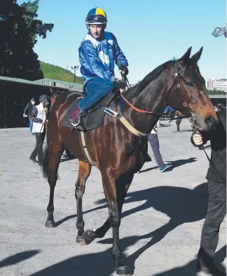  ?? Picture: AAP IMAGES ?? Jockey Hugh Bowman leads champion mare Winx back to her stable.