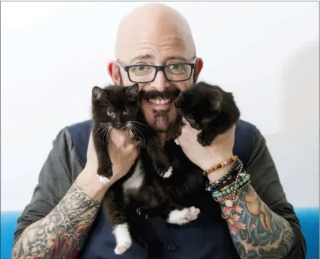  ?? THE ASSOCIATED PRESS ?? In this photo, TV personalit­y Jackson Galaxy, from the Animal Planet series, “My Cat From Hell,” poses for a portrait in New York to promote his latest book, “Total Cat Mojo: The Ultimate Guide To Life With Your Cat.”