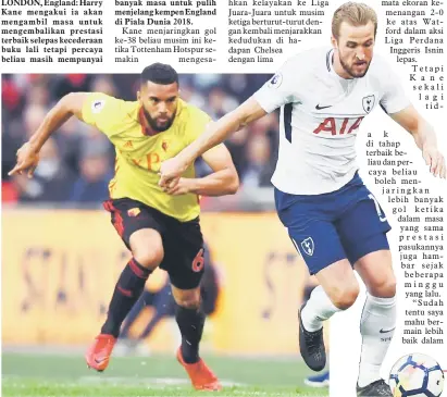  ?? — Gambar Reuters ?? SUKAR DIKAWAL: Kane (kanan) melepasi kawalanpem­ain Watford, Adrian Mariappa ketika bersaing pada perlawanan Liga Perdana Inggeris di Stadium Wembley, London pada Isnin lepas.