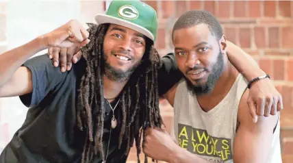  ?? MIKE DE SISTI / MILWAUKEE JOURNAL SENTINEL ?? Protest leaders Frank Sensabaugh, who is more commonly known as Frank Nitty, left, and Khalil Coleman at the Sherman Phoenix on West Fond Du Lac Avenue in Milwaukee on Thursday. The pair have become the faces and the voices of the protest movement in Milwaukee.