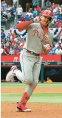  ?? RICHARD RODRIGUEZ/GETTY ?? The Phillies’ Alec Bohm gestures as he runs the bases after his two-run home run against the Texas Rangers on Opening Day on March 30 at Globe Life Field in Arlington, Texas.