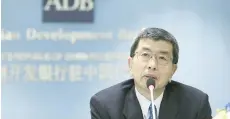  ?? — Reuters ?? ADB President Takehiko Nakao speaks at a news conference in Beijing.