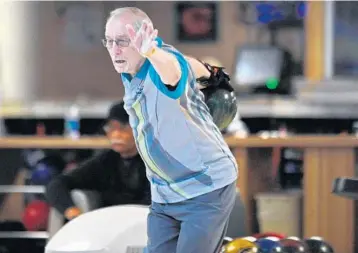  ?? GARY CURRERI/CORRESPOND­ENT ?? Fort Lauderdale's Stan Stempien, 78, focuses on the pins during the Competitiv­e Senior Bowling Tournament at Manor Lanes inWilton Manors. The event takes place once each month and involves seniors from the tri-county area.