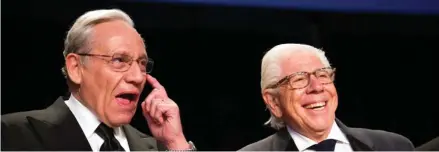  ?? (Photo by Cliff Owen, AP) ?? Bob Woodward, left, talks with Carl Bernstein during the White House Correspond­ents' Dinner in Washington, Saturday, April 29, 2017.