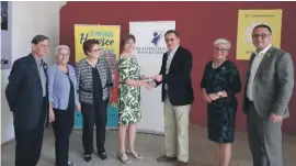  ??  ?? Hospice Malta Council Members together with Ms. Maria Gatt, Chairperso­n of Hospice Malta and Mr. Julian Sammut from the Alfred Mizzi Foundation