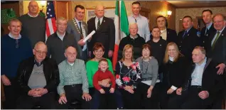  ?? (Above) (Below right) ?? Mayor Sheahan with Kerry Associatio­n members at the Kerry Hall. (Below left) The Mayor with the O’Sullivan clan from Cromane. The Mayor lays a wreath at Ground Zero.