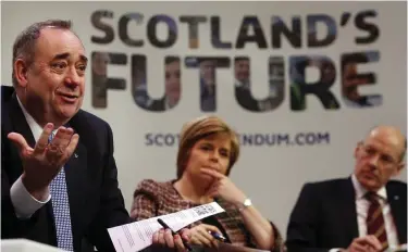  ?? ?? SNP stalwart: John Swinney, right, with Nicola Sturgeon and Alex Salmond in 2014