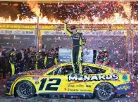  ?? AP Photo/lm Otero ?? Ryan Blaney (12) celebrates in Victory Lane Sunday after winning the NASCAR All-star auto race at Texas Motor Speedway in Fort Worth, Texas.