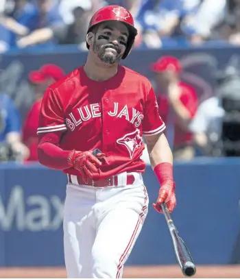  ?? CHRIS YOUNG/CP FILES ?? The Toronto Blue Jays have placed second baseman Devon Travis on the 10-day disabled list with a right knee injury. The team said Travis has a bone bruise as well as a cartilage injury.