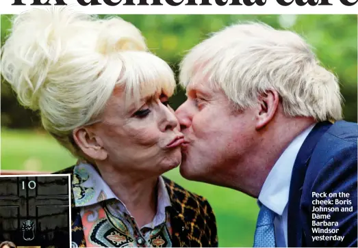  ??  ?? Peck on the cheek: Boris Johnson and Dame Barbara Windsor yesterday