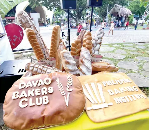  ??  ?? Giant bread baked by members of the Davao Bakers Club