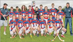  ??  ?? Kingussie Under 14s celebrate after beating Lochaber Under 14s 6-4 in the final of the Kenneth MacMaster Cup. Photograph: Neil Paterson.