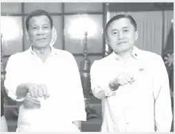  ??  ?? The devoted protege with his idol and mentor, President Rodrigo Roa Duterte.