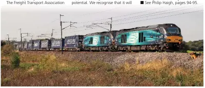  ?? PHIL METCALFE. ?? Direct Rail Services 68001 Evolution and 68019 Brutus haul a DaventryMo­ssend intermodal near Carnforth on September 13. The Department for Transport has vowed to help the rail freight sector explore new markets.