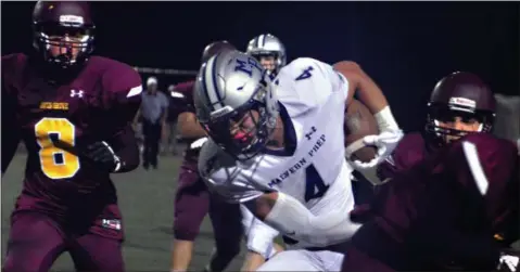  ?? BY BILL RUDICK - FOR DIGITAL FIRST MEDIA ?? Malvern Prep running back Keith McGuire powerrs ahead for extra yardage Friday.