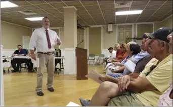  ?? JULIO MORALES PHOTO ?? County Public Works Department Director John Gay addresses residents of Orchard Road on Tuesday at Holtville City Hall during an informal meeting that was intended to address traffic concerns.