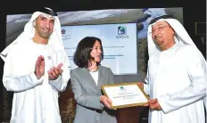  ?? Clint Egbert/Gulf News ?? From left: Thani Bin Ahmad Al Zeyoudi, Martha Rojas Urrego and Dawood Abdul Rahman Al Hajiri declare the Jebel Ali Wetland Sanctuary a Ramsar site yesterday.