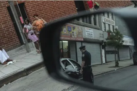  ?? ROBERT STOLARIK FOR THE NEW YORK TIMES FILE PHOTO ?? In this June 2010 photo, an NYPD officer asks a driver for ID on Rockaway Ave. in Brooklyn as part of the now-discontinu­ed “stop-and-frisk” policy.