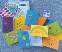  ??  ?? Cards bearing uplifting messages are sent to self-isolating seniors.