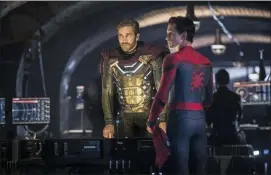 ?? JAY MAIDMENT — COLUMBIA PICTURES — SONY VIA AP ?? This image released by Sony Pictures shows Jake Gyllenhaal, left, and Tom Holland in a scene from “Spider-Man: Far From Home.”