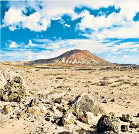  ??  ?? Filming in Fuertevent­ura, above, and diving with sharks, top right, appealed to Corinne Bailey Rae