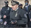  ?? PETE BANNAN - MEDIANEWS GROUP ?? Darby Police Chief Joseph Gabe holds one of the 1,200 radios going to every fulland part-time police officer in the county.